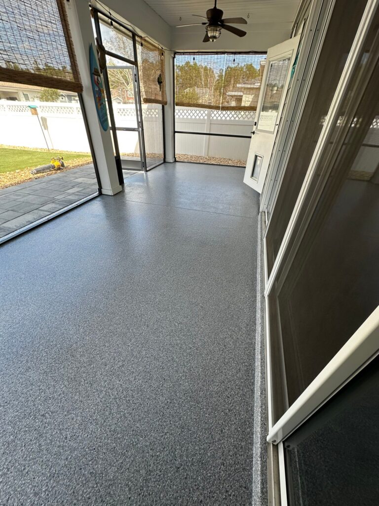 Covered lanai floor with blue-gray concrete coating